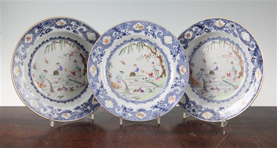 A pair of Chinese famille rose soup plates and matching plate, Qianlong period, diameter 23cm (3)